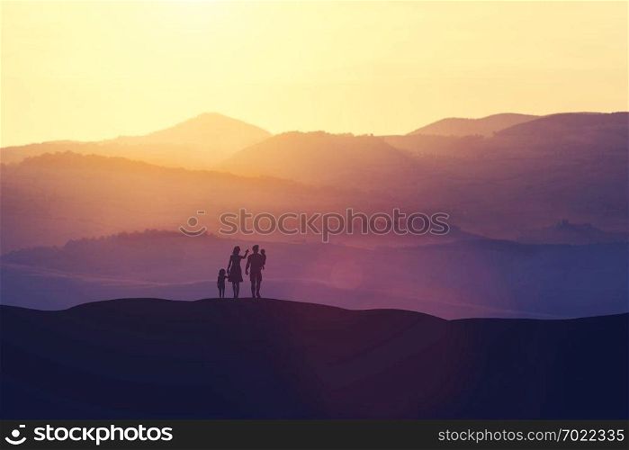Couple with two children standing on a hill, mother pointing her finger. Happy family. Planning the future. 3D illustration.. Family with two children standing on a hill