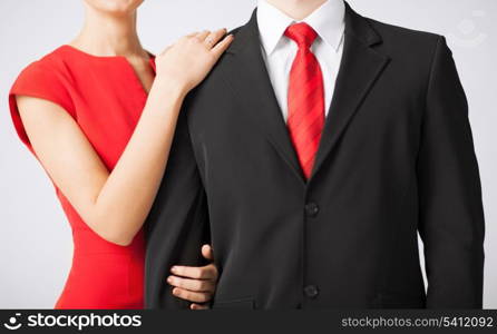 couple with wedding ring holding each other hands