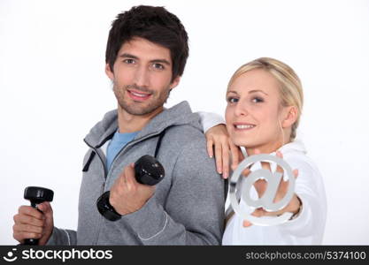 Couple with weights and email symbol