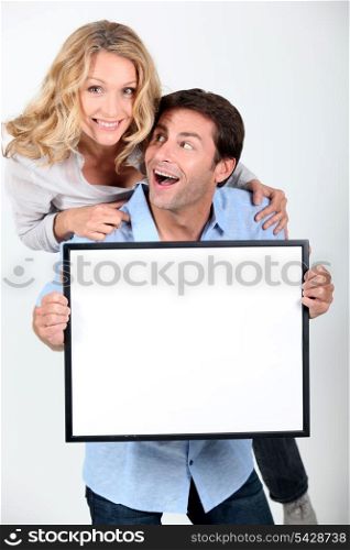 Couple with white board