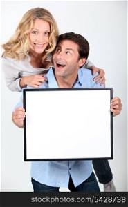 Couple with white board