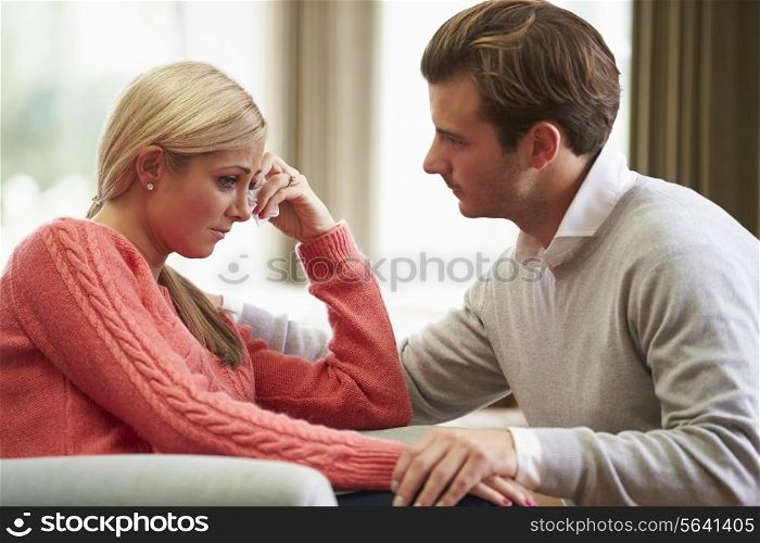 Couple With Woman Suffering From Depression