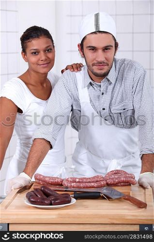 Couple working in a butchers