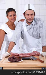 Couple working in a butchers