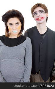 couple young people dressed as clowns, isolated