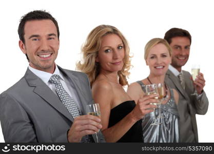Couples drinking champagne