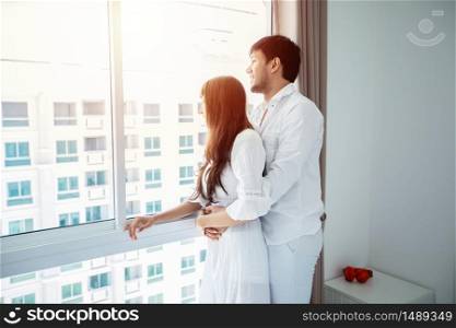 couples lover Laying On Bedroom Happiness Lifestyle and smiling girl relaxing at home
