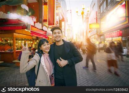couples of asian woman happiness and relaxing in dotonbori district one of most popular traveling destination in osaka japan