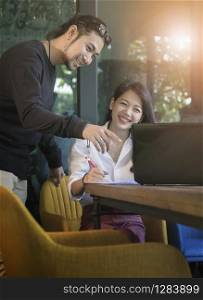 couples of asian younger freelance working with happiness emotion at home office