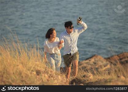 couples of younger man and woman in love relaxing vacation outdoor lifestyle