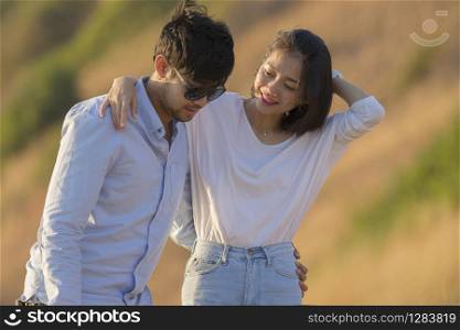 couples younger asian man and woman relaxing time on vacation destination traveling