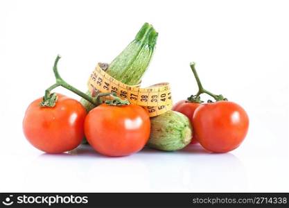 courgettes and tomatoes with meter isolated on white