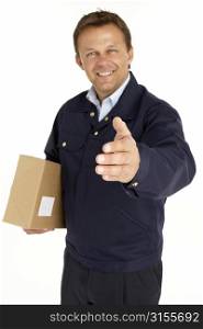 Courier Extending His Hand For A Handshake And Holding A Parcel