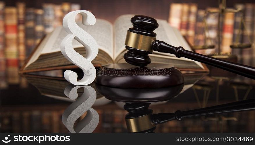 Court gavel,Law theme, mallet of justice, Paragraph, mirror back. Paragraph, law and justice concept, wooden gavel, mirror background