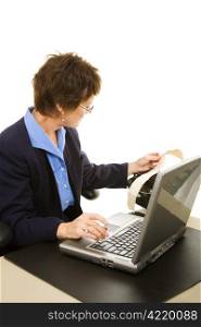 Court reporter transcribing her notes into a laptop computer. Isolated on white.