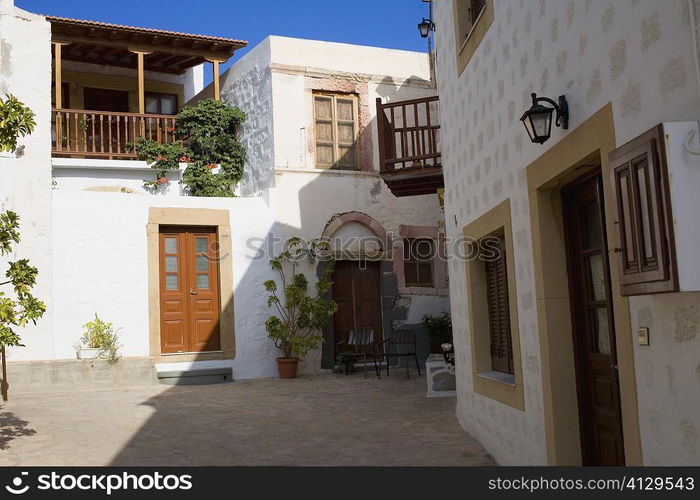 Courtyard of buildings, Patmos, Dodecanese Islands, Greece