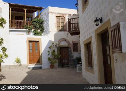 Courtyard of buildings, Patmos, Dodecanese Islands, Greece