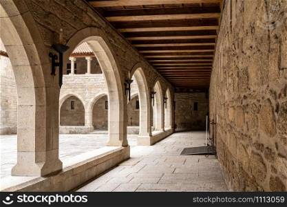 Courtyard or cloisters inside the palace of the Dukes of Braganza in Guimaraes in northern Portugal. Courtyard inside the palace of the Dukes of Braganza