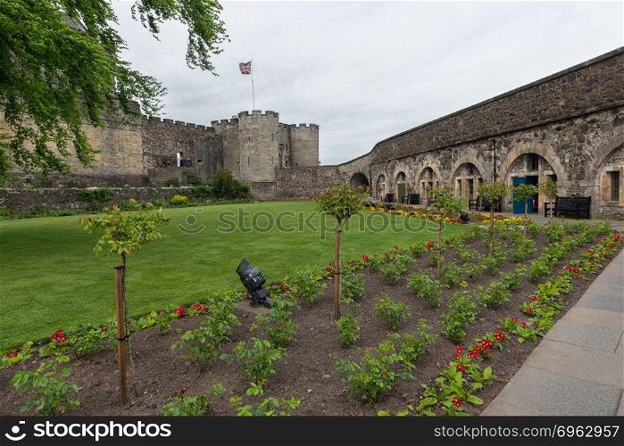 Courtyard Scottish Stirling Castle with garden and colorful flower bed. Courtyard Scottish Stirling Castle with garden and flower bed