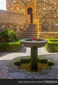 Courtyards and gardens of the famous Palace of the Alcazaba in Malaga Spain