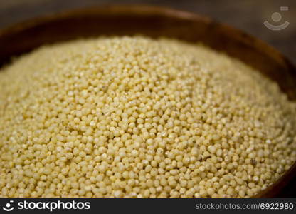 Couscous for a healthy diet on wooden background