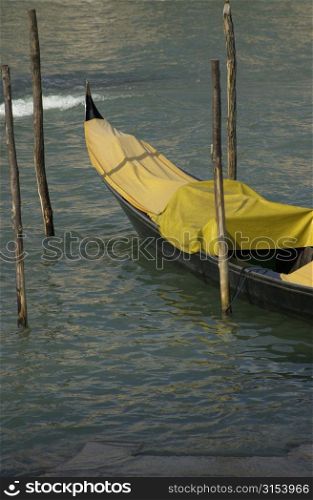 Covered gondola in a canal in Venice, Italy