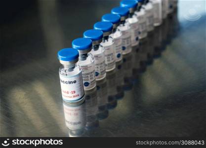 Covid-19 Coronavirus Vaccine vials in a row macro close up