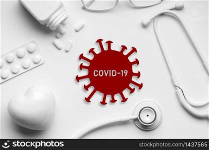 COVID 19 or Corona virus icon on top view of medical equipment