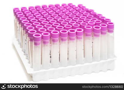 Covid-19 outbreak blood test. Close up view of empty test tubes for blood samples of Coronavirus patients, on a rack .. Covid-19 outbreak blood test. Close up view of empty test tubes for blood samples of Coronavirus patients, on a rack.