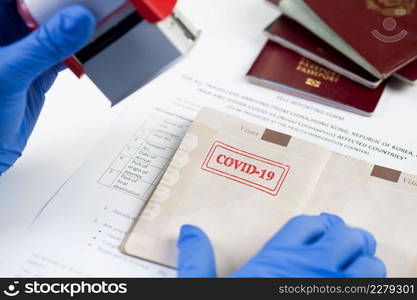 COVID-19 st&ed in passport,airport border customs health and safety security check,restrictive no entry measures due to COVID-19 corona virus disease epidemic,Coronavirus global pandemic,US   UK 