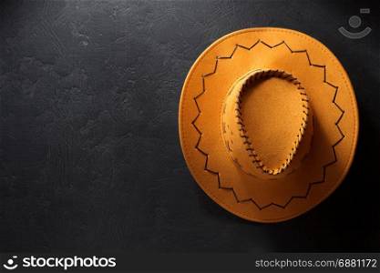 cowboy hat on black background texture