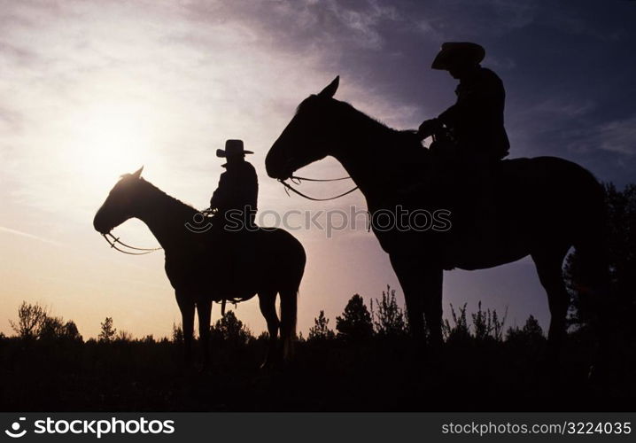 Cowboys at Sunset