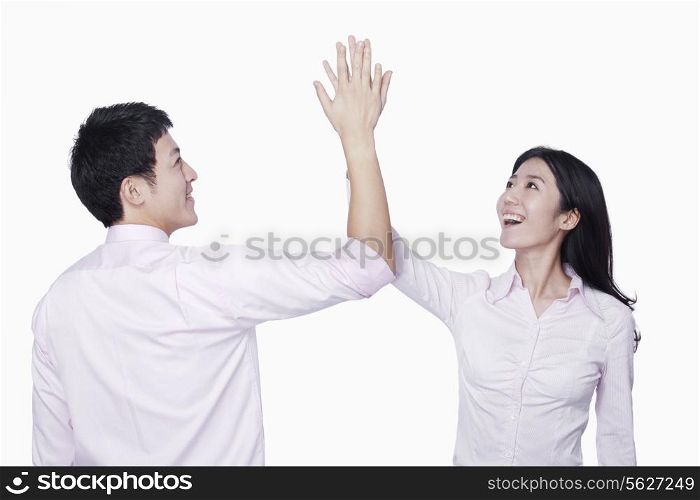 Coworkers high-five