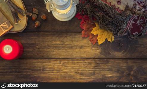 cozy autumn composition with lantern leaves