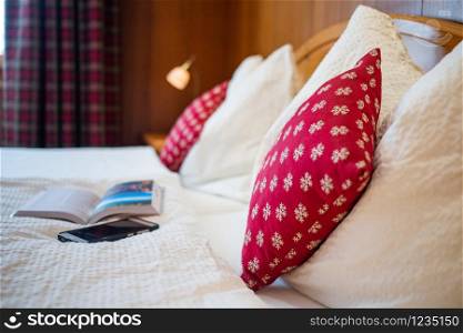 cozy bedroom red pillows hygge