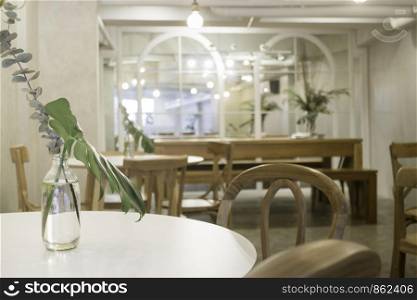 Cozy coffee shop with wooden furniture set, stock photo