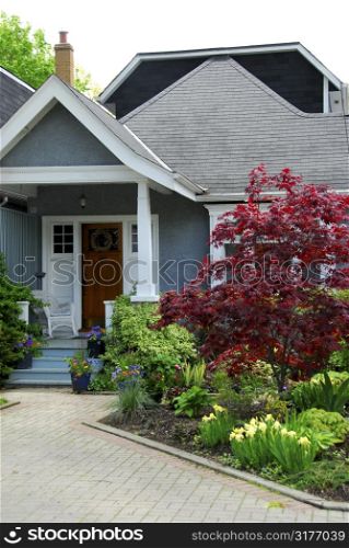 Cozy home with beautuful landscaping