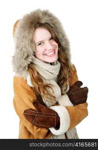 Cozy smiling young woman in winter coat on white background