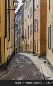 Cozy street with picturesque houses in the old town. Stockholm. Sweden