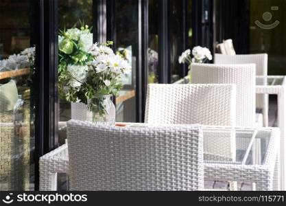 cozy warm white table and chair, outdoor, restaurant