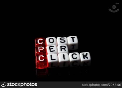 CPC Cost Per Click writen on black and white dices