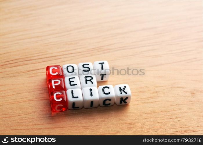 CPC Cost Per Click written on dices on wood