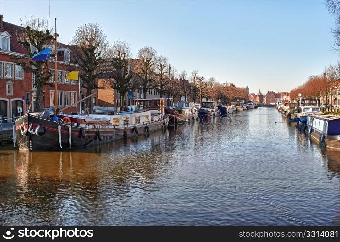 cping barge canal view in bruges, belgium
