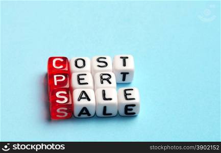 CPS Cost Per Sale written on dices on blue background
