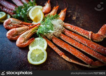 Crab legs on brown rustic background