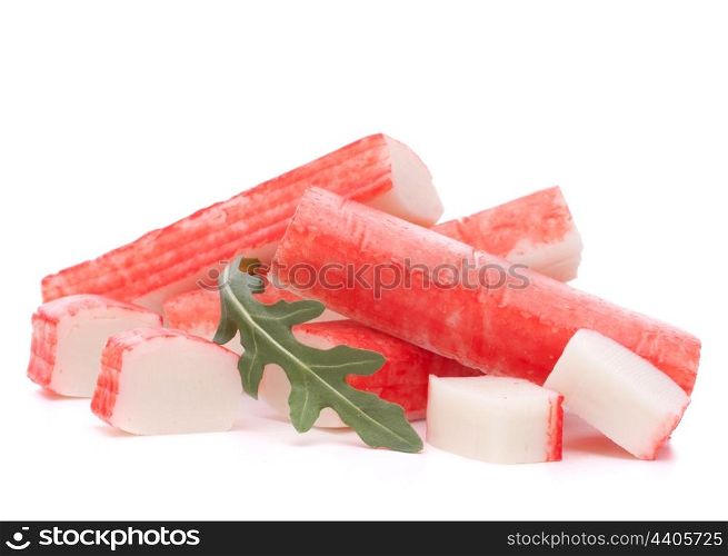 Crab sticks group and rucola leaf isolated on white background