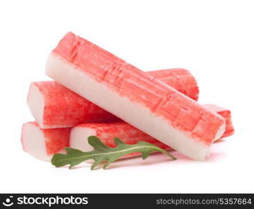 Crab sticks group and rucola leaf isolated on white background