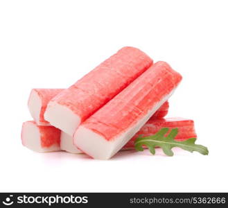 Crab sticks group and rucola leaf isolated on white background