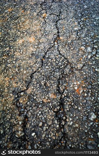 Crack asphalt old road texture background