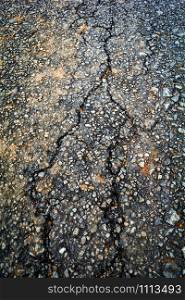 Crack asphalt old road texture background